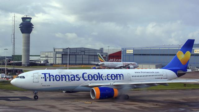 Un avion de Thomas Cook sur le tarmac de l'aéroport de Manchester en août 2019. [AP PA - PETER BYRNE]