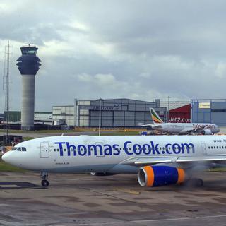 Un avion de Thomas Cook sur le tarmac de l'aéroport de Manchester en août 2019. [AP PA - PETER BYRNE]