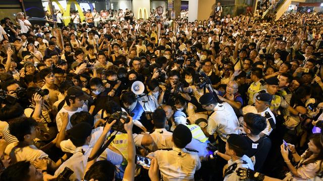 Un million de personnes se mobilisent à Hong Kong contre l'extradition de prisonniers chinois. [EPA Keystone - Edwin Kwok]