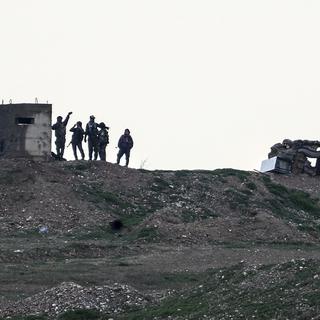 Des combattants de l'YPG réunis à l'ouest de Kobané. [DHA via AP/Keystone - Ugur Can]