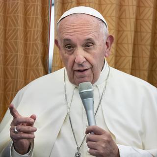 Le pape François lors d'une conférence de presse en 2018. [Keystone - Laurent Darbella]