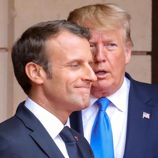 Emmanuel Macron et Donald Trump se sont rencontrés en marge des commémorations du D-Day. [EPA/Keystone - Ludovic Marin]