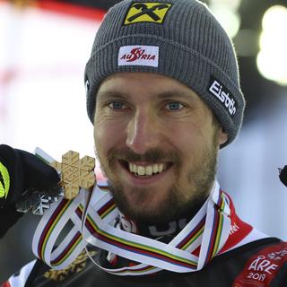 Marcel Hirscher a décroché son 3e titre mondial en slalom à Are. [Keystone - Marco Trovati]