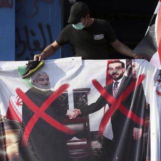 La contestation gronde en Irak contre les politiciens locaux entretenant des liens avec le régime iranien. [AP Photo/Keystone - Hadi Mizban]