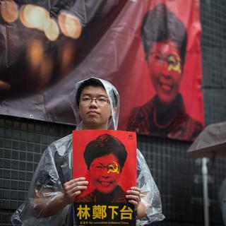 Des manifestants à Hong Kong pour célébrer le 30e anniversaire de Tienanmen. [Keystone - EPA/Jérome Favre]