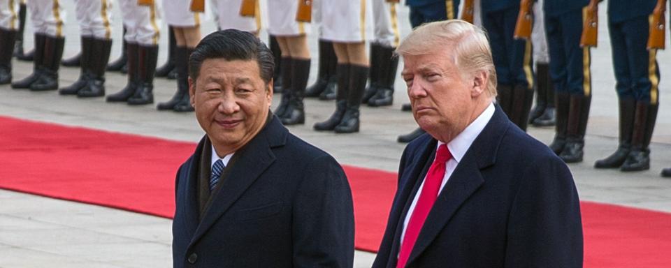 Les tensions entre la Chine et les Etats-Unis sont néfastes pour l’économie. [Keystone/EPA - Roman Pilipey]