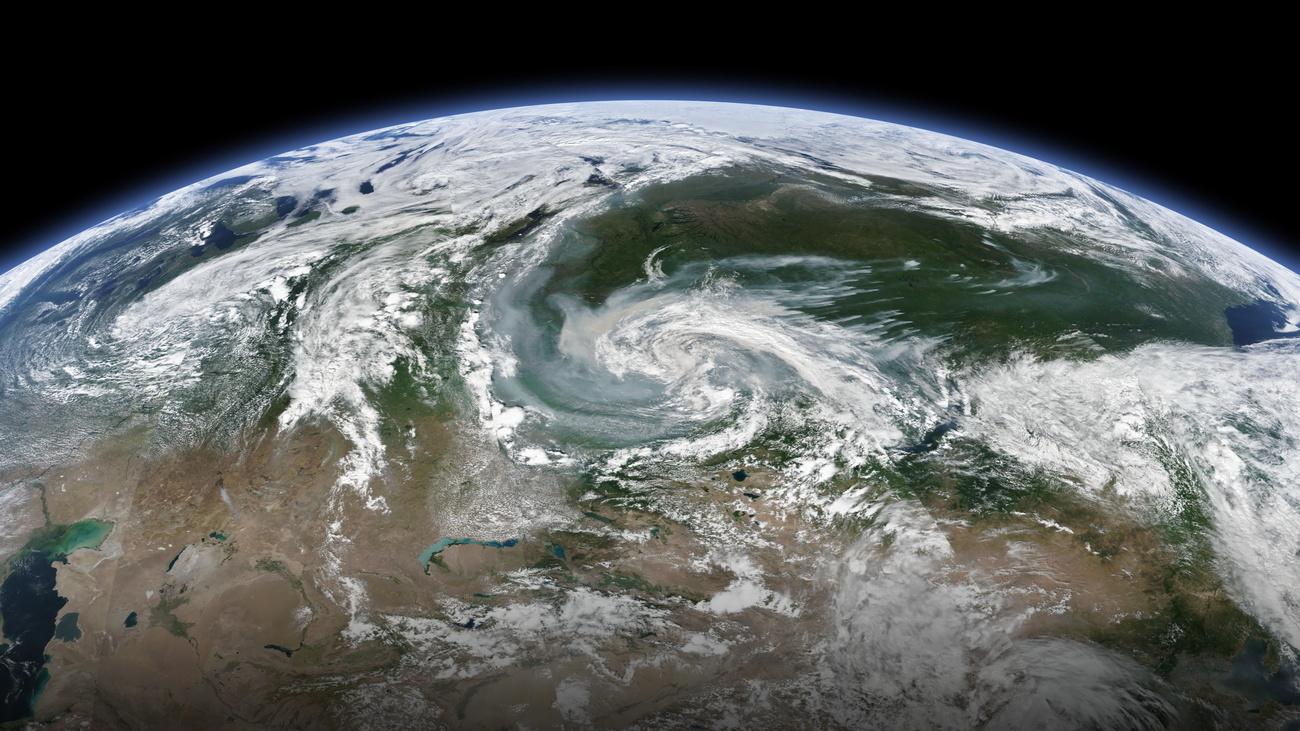 Les images satellites de la Nasa montrent d'impressionnants nuages de fumée partant des feux et atteignant les zones arctiques. [NASA/EPA/Keystone - NASA EARTH OBSERVATORY HANDOUT]