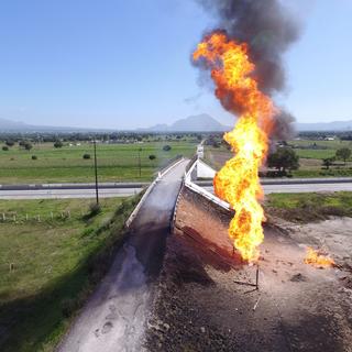 Valve clandestine sur un pipeline dans l'Etat mexicain de Puebla, en juillet 2018. [AFP - Jose Castanares]