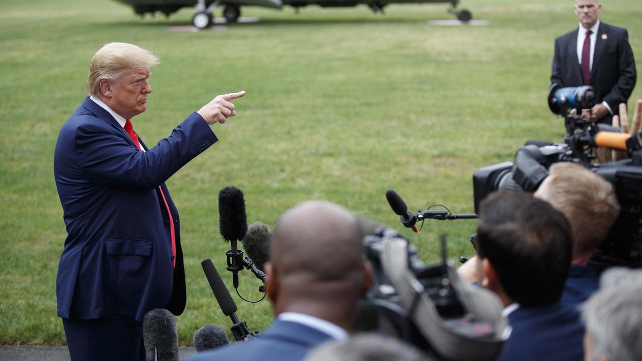 Donald Trump face à la presse. [Keystone - Shawn Thew/EPA]