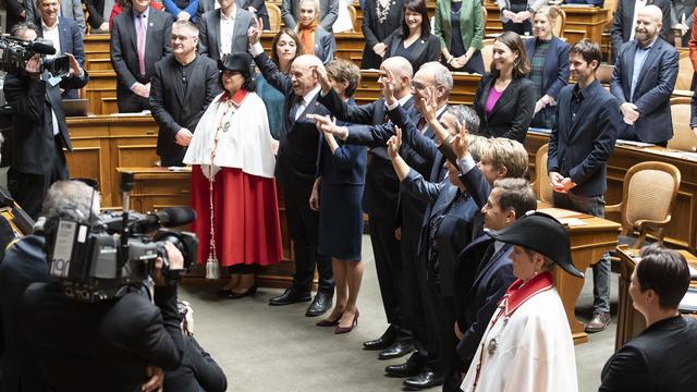 Le Conseil fédéral réélu. [Keystone - Anthony Anex]