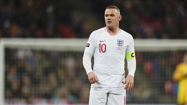 Rooney avec le brassard de capitaine lors de son ultime match pour les "Three Lions" en novembre 2018. [AFP - JASON BROWN]