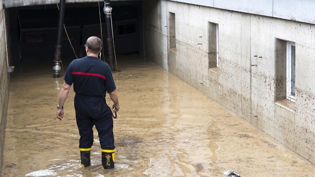 Malgré les pompages, certains sous-sols sont toujours inondés dans le Val-de-Ruz. [Keystone - Laurent Gillieron]