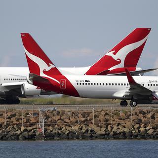 Deux avions de Qantas à l'aéroport de Sydney, en Australie. [Keystone/ap photo - Rick Rycroft]