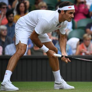 Federer a très rapidement fait la différence sur le Central de Wimbledon. [AFP - Ben Stansall]