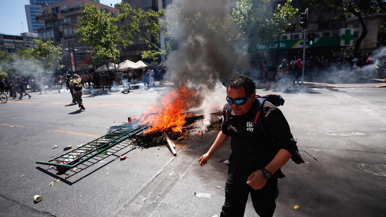 La protestation au Chili touche désormais également les quartiers chics de la capitale Santiago. [Alberto Valdes]