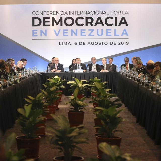 Une conférence internationale se tient à Lima pour trouver une solution à la crise au Venezuela. [Keystone - Martin Mejia]