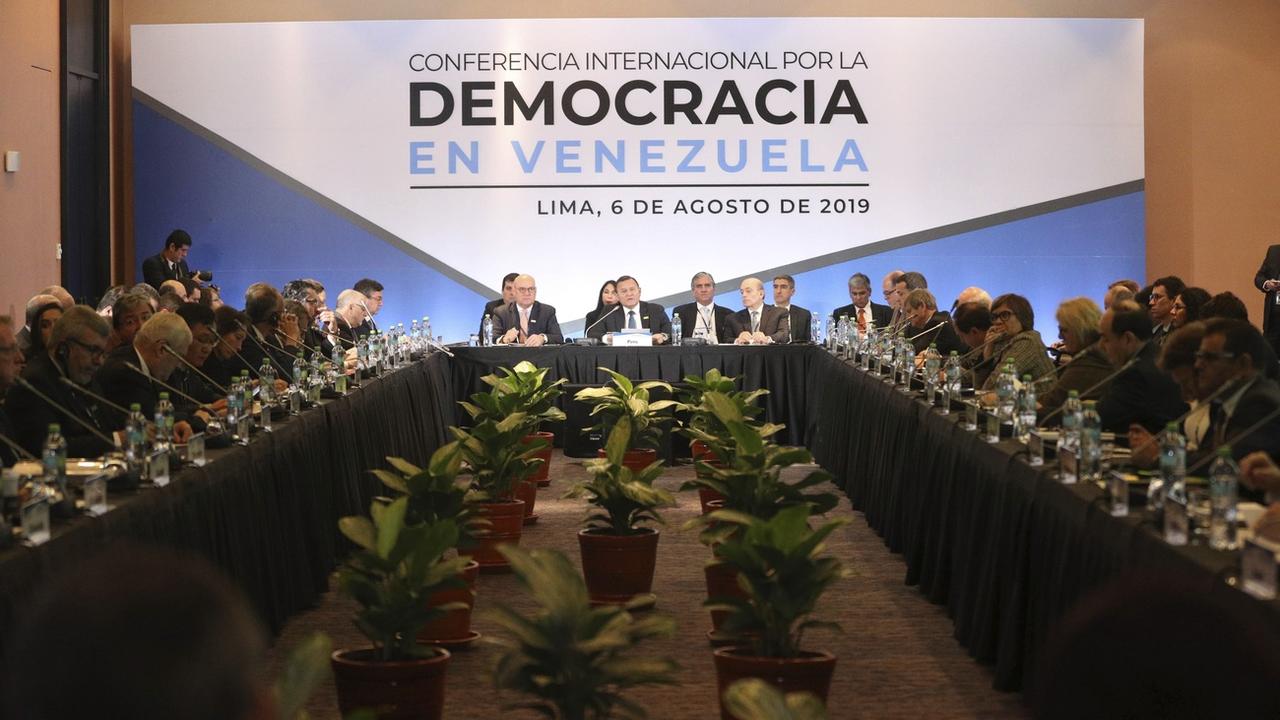 Une conférence internationale se tient à Lima pour trouver une solution à la crise au Venezuela. [Keystone - Martin Mejia]