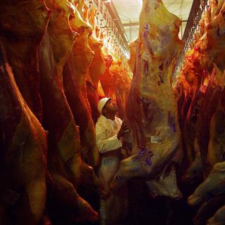Depuis 1961, la production de viande par habitant a plus que doublé dans le monde. [AP/Keystone - Alexandre Meneghini]