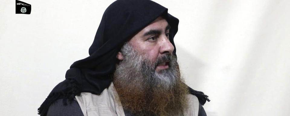 Le chef du groupe EI, Abou Bakr al-Baghdadi, refait son apparition en vidéo. [Keystone]