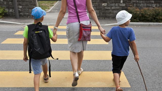 La Suisse a enregistré l’an dernier une centaine d'enlèvements d’enfant par un de ses parents en 2018. [Keystone]