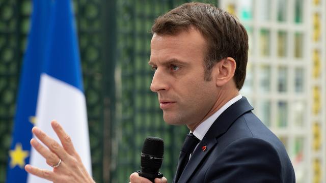 Emmanuel Macron lance un appel à la réconciliation avec l'Italie. [Keystone - Caroline Blumberg]