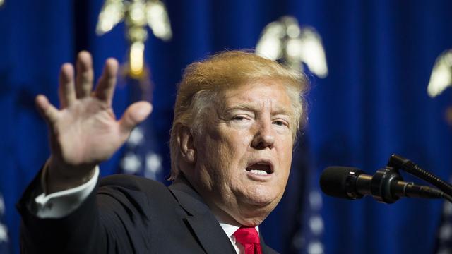 Donald Trump lors d'un meeting à Washington vendredi soir. [Keystone - AP Photo/Alex Brandon]