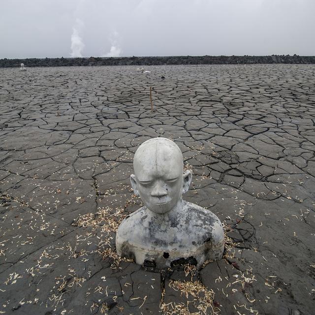 Une statue semi-immergée dans la boue dans la région de disoarjo, à l'est de Java.
JUNI KRISWANTO
AFP [JUNI KRISWANTO]