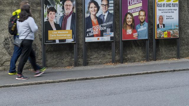 Plusieurs affiches pour l'élection au Conseil des Etats à Genève. [Keystone - Martial Trezzini]