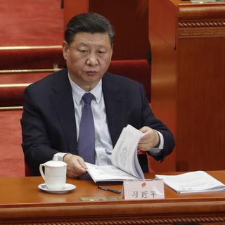 Le président chinois Xi Jinping lors de la session annuelle du parlement chinois. [EPA-EFE/Keystone - Wu Hong]