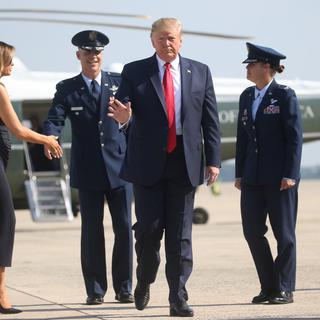 Donald et Melania Trump avant leur départ pour Dayton et El Paso. [Reuters - Leah Millis]