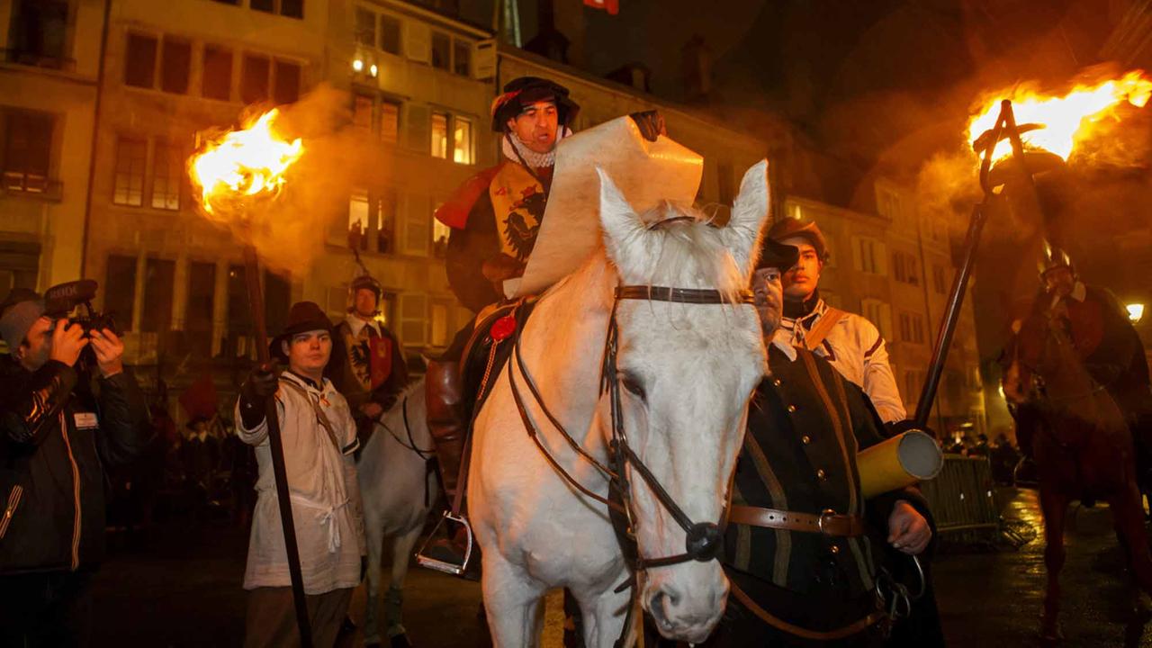 Un membre de la compagnie 1602 lors des festivités de l'Escalade à Genève en 2018. [Keystone - Salvatore Di Nolfi]