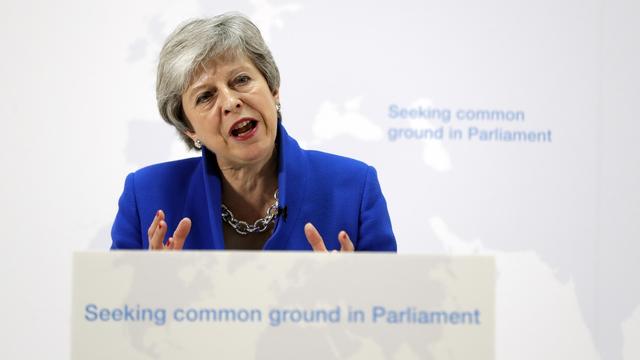 Theresa May annoncé une série de compromis pour sortir de l'impasse. [Keystone - AP Photo/Kirsty Wigglesworth, pool]