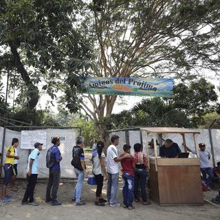 Au Venezuela, les deux camps cherchent à instrumentaliser l'aide internationale. [AP Photo/Keystone - Fernando Vergara]