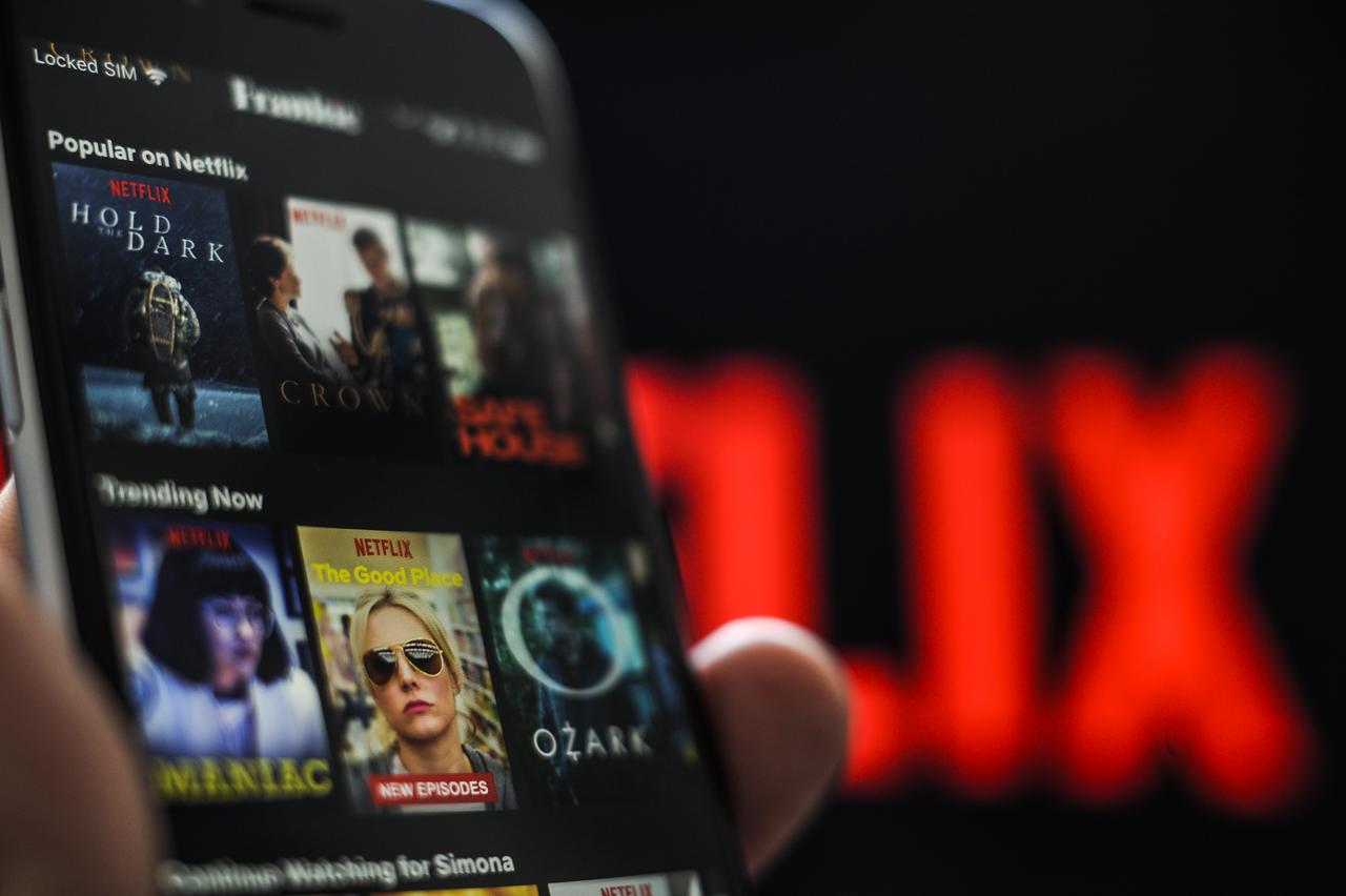 L'application du géant du streaming Netflix sur un téléphone. [AFP - Jaap Arriens / NurPhoto]