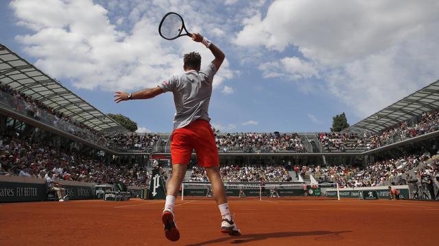 Stan Wawrinka remporte son premier tour à Roland Garros contre le Slovaque Jozef Kovalik. [Keystone - Christophe Ena / AP Photo]