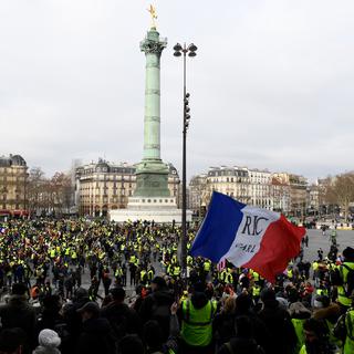 Les "gilets jaunes" se rassemblent sur la place de la Bastille, à Paris, samedi 12 janvier. [AFP - Bertrand Guay]