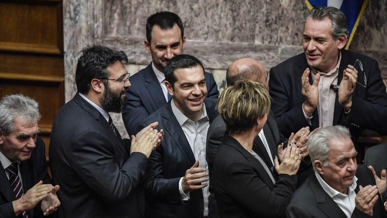 Le Premier ministre grec Alexis Tsipras conserve la confiance du parlement. [AFP - Louisa Gouliamaki]