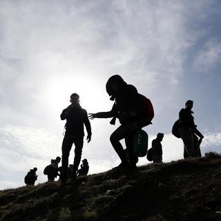 Un groupe de migrants marche en direction de la frontière entre la Grèce et la Turquie. Erdine, Turquie, le 3 mars 2020. [Keystone/epa - Erdem Sahin]