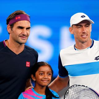 Roger Federer et John Millman. [EPA/Keystone - Scott Barbour]
