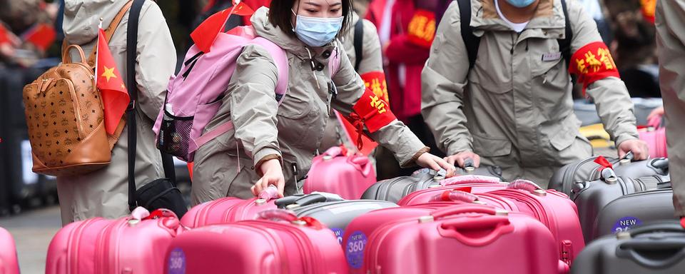 Les habitants du Hubei pourront sortir des frontières provinciales dès le 25 mars. [Xinhua/AFP - Chen Yehua]