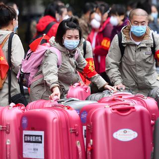 Les habitants du Hubei pourront sortir des frontières provinciales dès le 25 mars. [Xinhua/AFP - Chen Yehua]