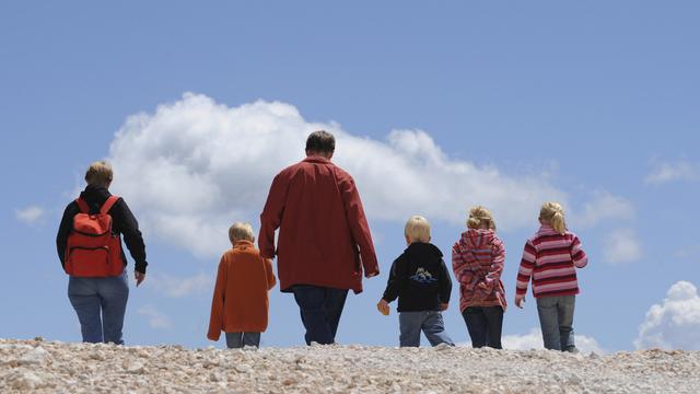 Les familles sont particulièrement touchées par les dettes. [AP/Keystone - Christof Stache]