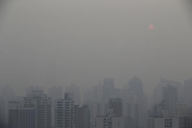 En raison de la pollution atmosphérique, la durée de vie moyenne est réduite de 4,1 ans en Chine. [Reuters - Aly Song]