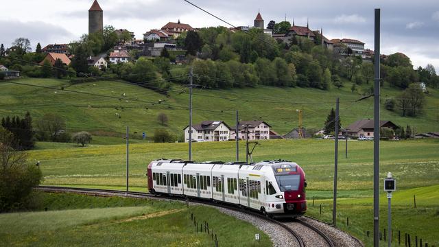 Les Transports publics fribourgeois ont plongé dans les chiffres rouges. [KEYSTONE - Jean-Christophe Bott]