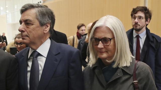 Les époux Fillon à leur arrivée au tribunal de Paris, mercredi 26.02.2020. [AP/Keystone - Thibault Camus]