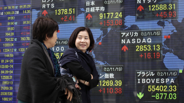 Les rôles traditionnels de l'homme et de la femme sont encore trop ancrés dans la société japonaise. [AP/Keystone - Shizuo Kambayashi]