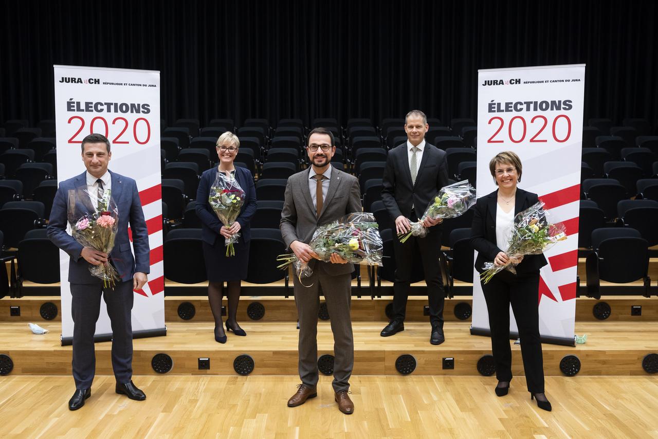 La photo des ministres réélus. [Keystone - Jean-Christophe Bott]