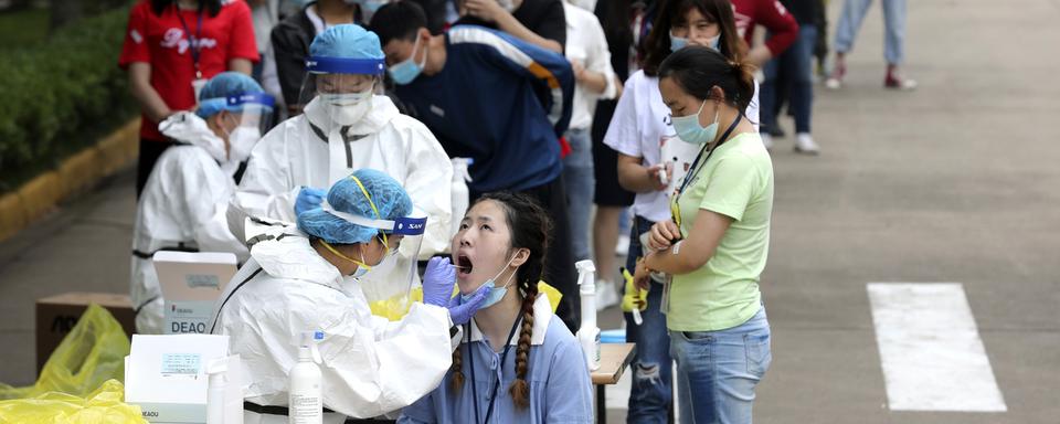 Nouvelles révélations de CNN sur l'apparition du Covid-19 en Chine. [Chinatopix/AP/Keystone]