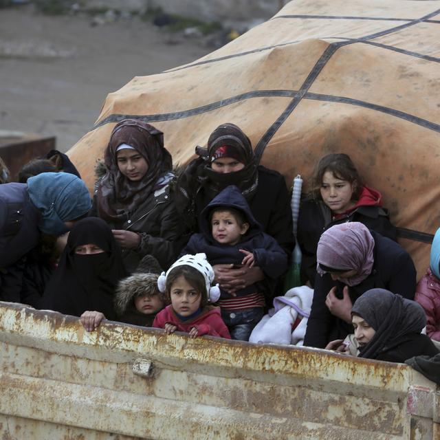 Des Syriens fuient l'avancée des forces gouvernementales à Idleb. [Keystone - AP Photo/Ghaith Alsayed]