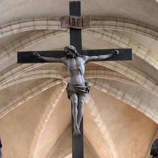 Jésus-Christ sur la Croix à l'Église Saint-Hippolyte. [AFP - Fred de Noyelle / Leemage]